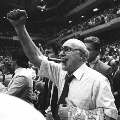 Why Did Red Auerbach Smoke All Those Cigars and Hold a Rolled-Up Game  Program While Coaching the Boston Celtics?